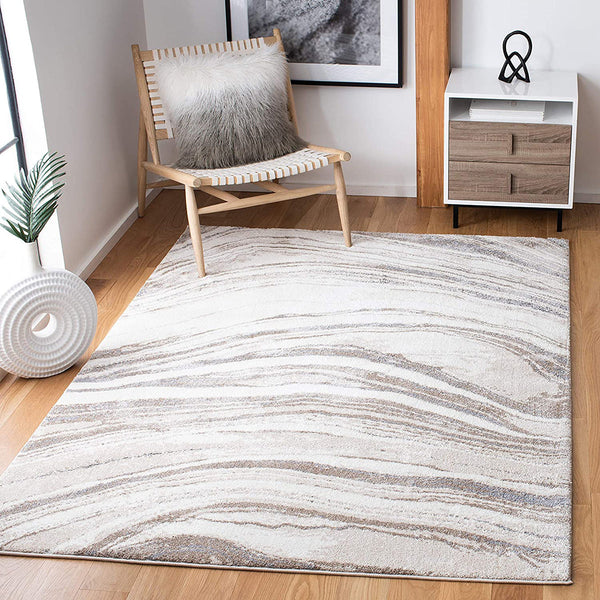Ivory taupe abstract patterned modern rug with soft neutral tones on wooden floor.