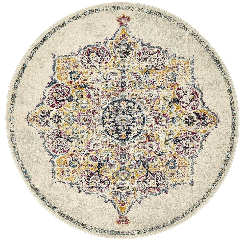 Round transitional bohemian rug with intricate multicolored circular floral pattern on bone background.