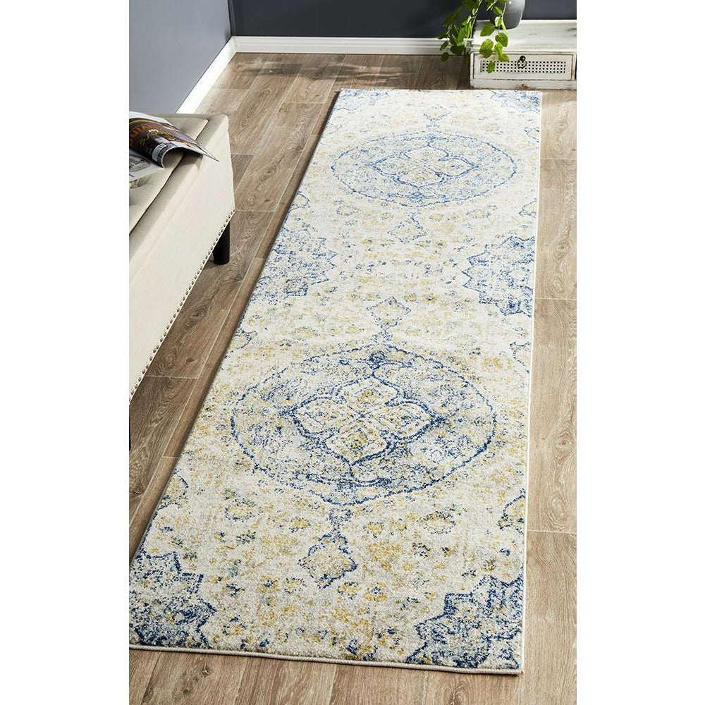 Blue and beige transitional bohemian runner rug with intricate circular medallion patterns.