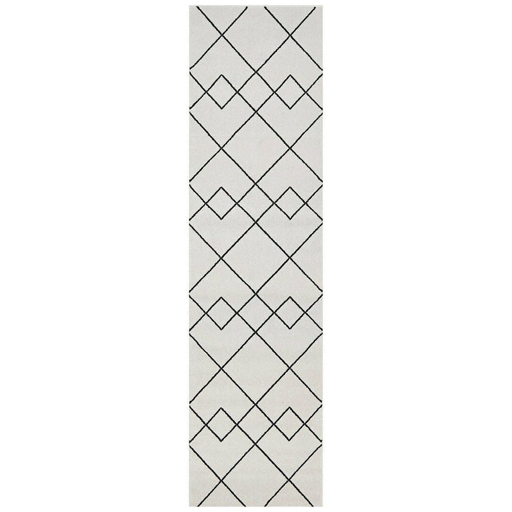 Cream runner rug with bold black geometric diamond and line pattern, modern style.