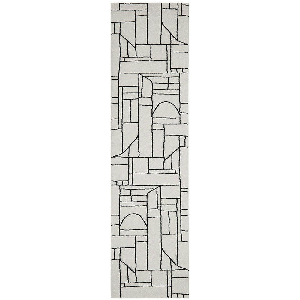 Cream runner rug with abstract black geometric line pattern.