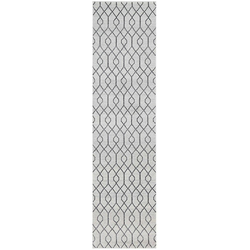 Cream grey runner rug with black geometric diamond pattern and textured weave.