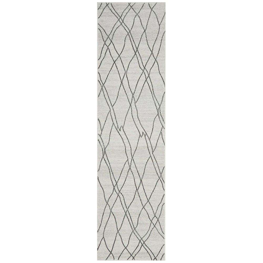Cream grey runner rug with intersecting dark geometric lines in a modern pattern.