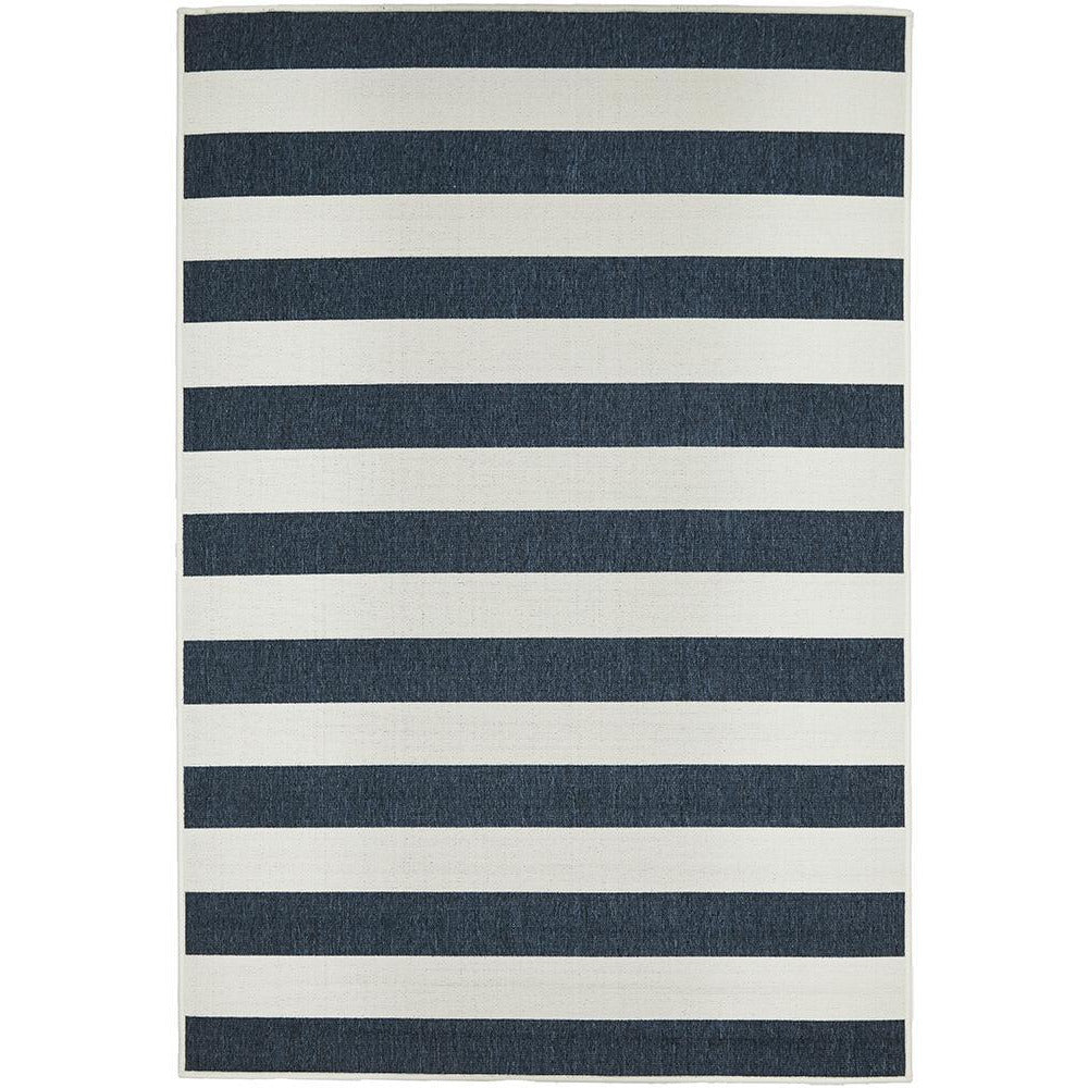 Rectangular navy blue and white striped indoor-outdoor rug with a modern coastal design.