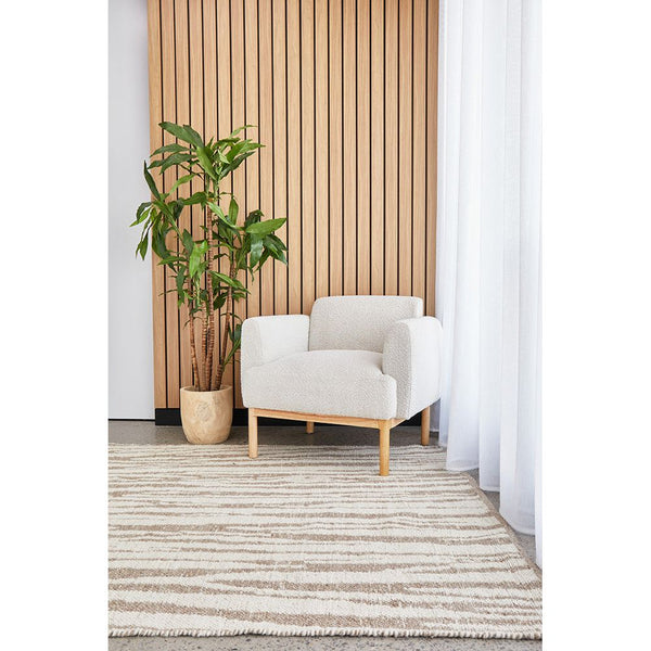 Neutral-toned wool blend rug with subtle stripe pattern in a modern living space.