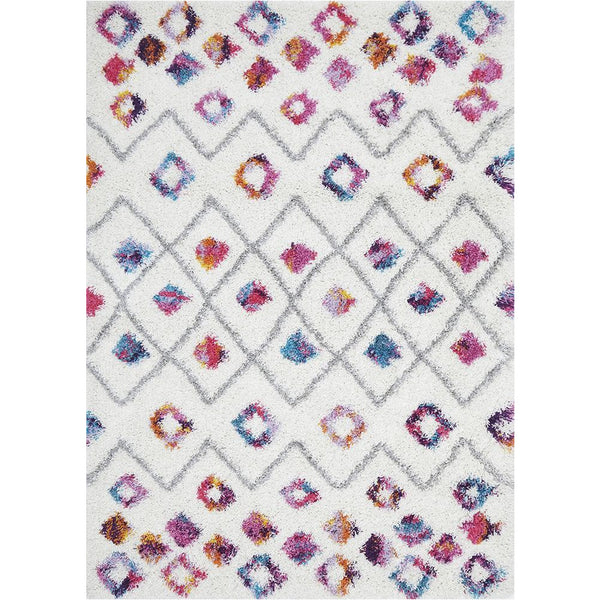 Rectangular white shaggy rug with multicolor Moroccan diamond and dot patterns in pink, blue, and orange.