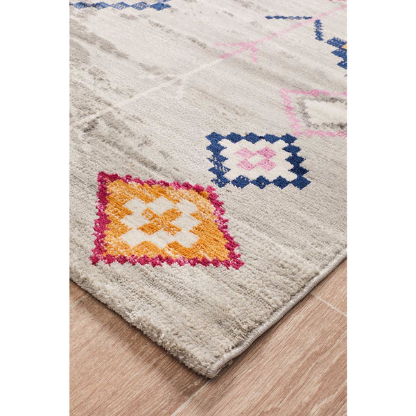Silver grey polypropylene rug with colorful diamond tribal patterns and a soft textured surface.
