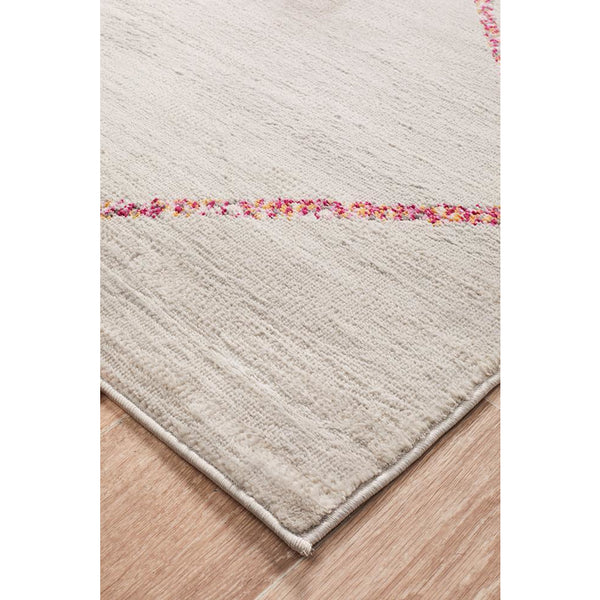 Silver grey rug with subtle pink and red tribal pattern, textured polypropylene weave, modern style.
